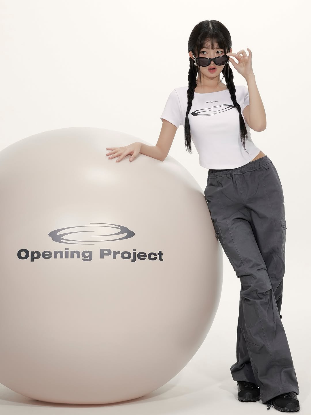 Photo shared by Opening Project on August 21, 2025 tagging @reinyourheart. May be an image of 1 person, playing softball and text that says 'H - -- Opening OpeningProject Project'.