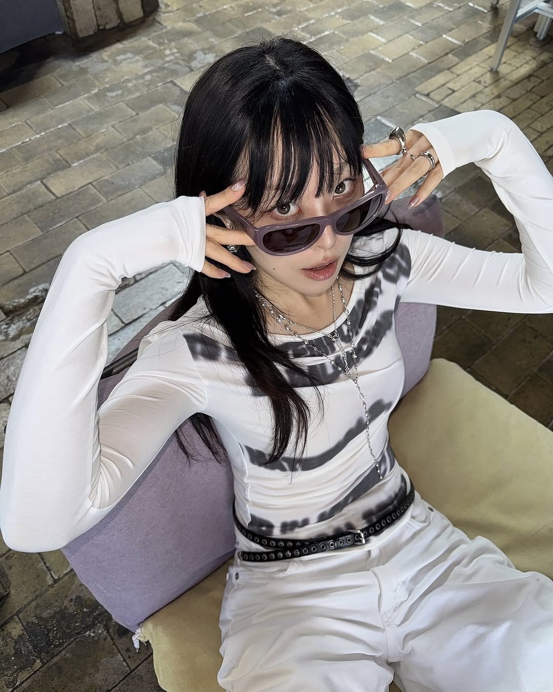 Photo by Opening Project on September 05, 2025. May be an image of one or more people, hair, eyewear, top, fishnet stockings, turtleneck and text.