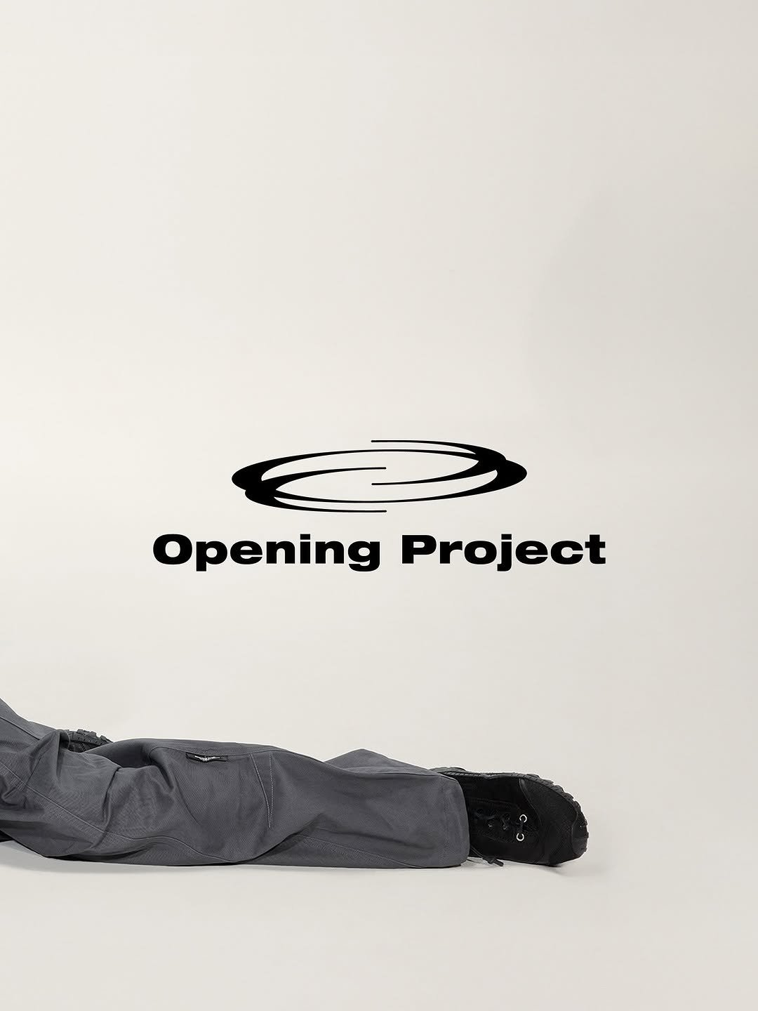 Photo shared by Opening Project on August 18, 2025 tagging @reinyourheart. May be an image of parka, sweatpants, magazine and text that says 'OpeningProject Opening Project'.