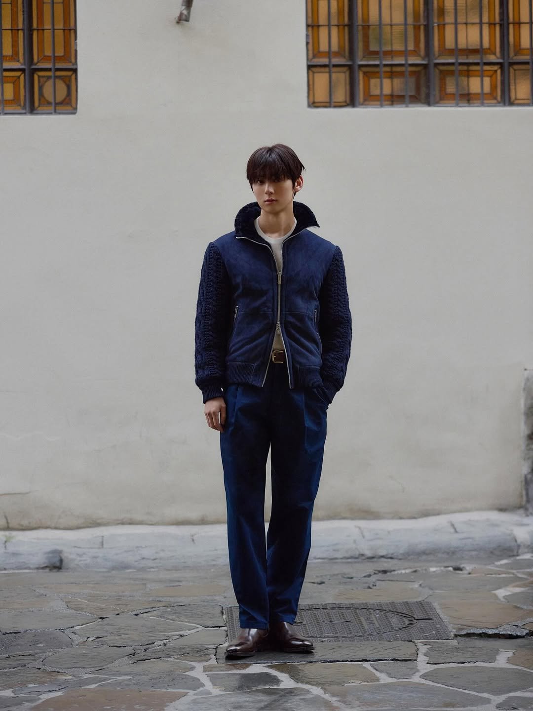 Photo shared by 황민현 on January 16, 2026 tagging @brunellocucinelli. May be an image of duffle coat, overcoat, goosedown coat, jacket and text.