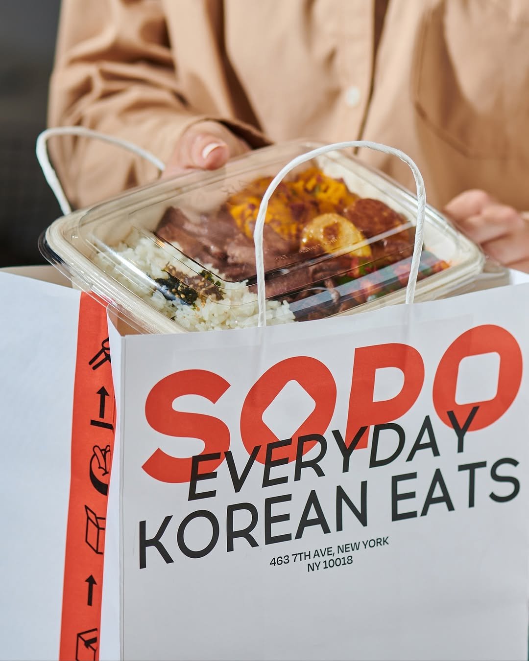 Photo by ORDINARY PEOPLE on June 26, 2025. May be an image of 1 person and text that says 'T I ለ SOBO ZVERYDAY EATS KOREAN NEWYORK YORK AVE, 463 7TH 4637THAVE,N NY10018 NY 10018 1'.