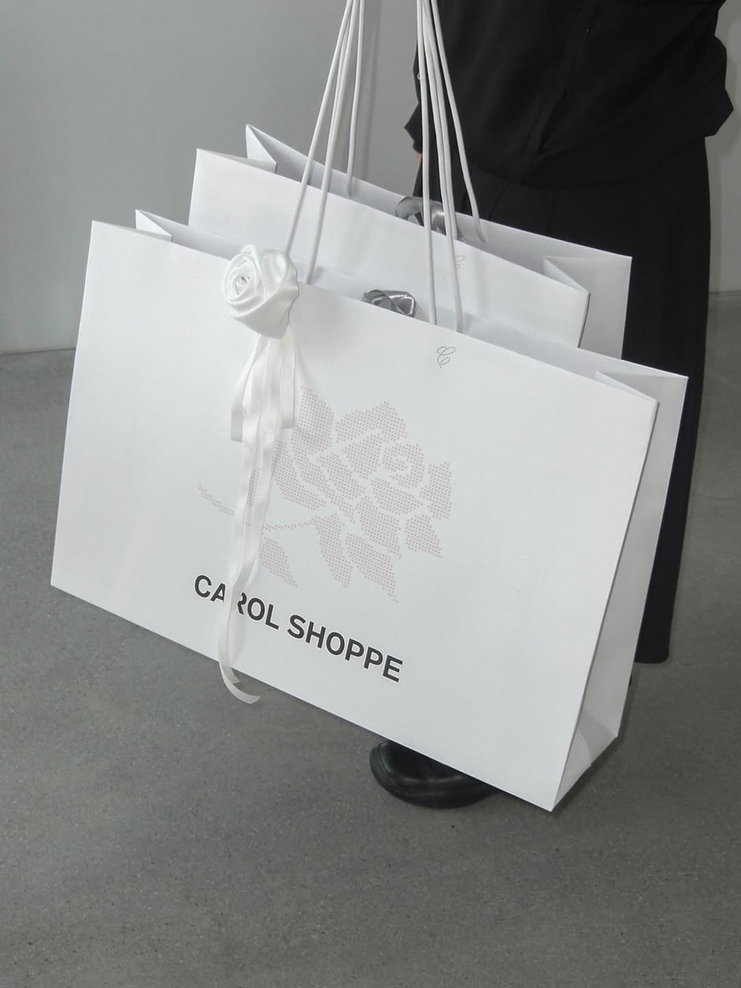 Photo shared by Orkr Inc. on January 28, 2026 tagging @carolshoppe_. May be an image of hamper, grocery bag and text that says 'อป ) CA ROL SHOPPE'.