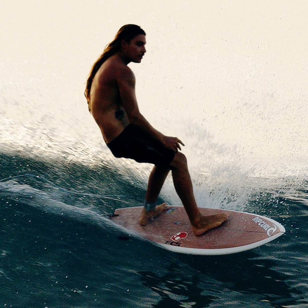 Photo shared by Skullcandy Australia on March 11, 2026 tagging @oscar.langburne. May be an image of surfboard, wetsuit, water and text.