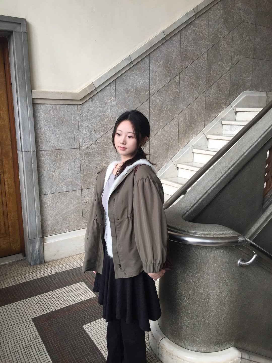 Photo by 수연 sooyeon on March 05, 2026. May be an image of overcoat, duffle coat, parka and text.