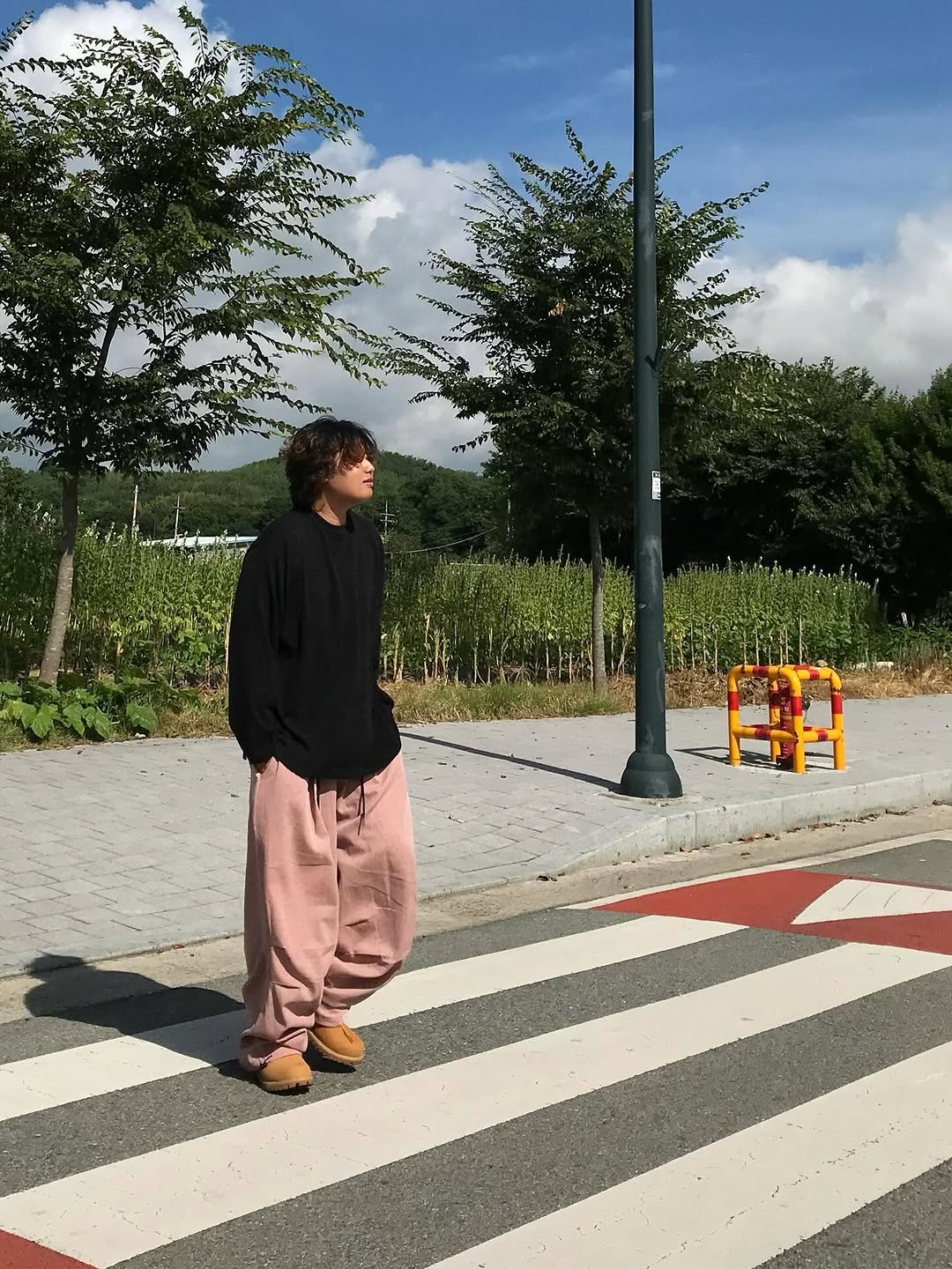 Photo shared by 오윤택/오태기 on September 16, 2025 tagging @ohtaeki_official. May be an image of 1 person, street, road and text.