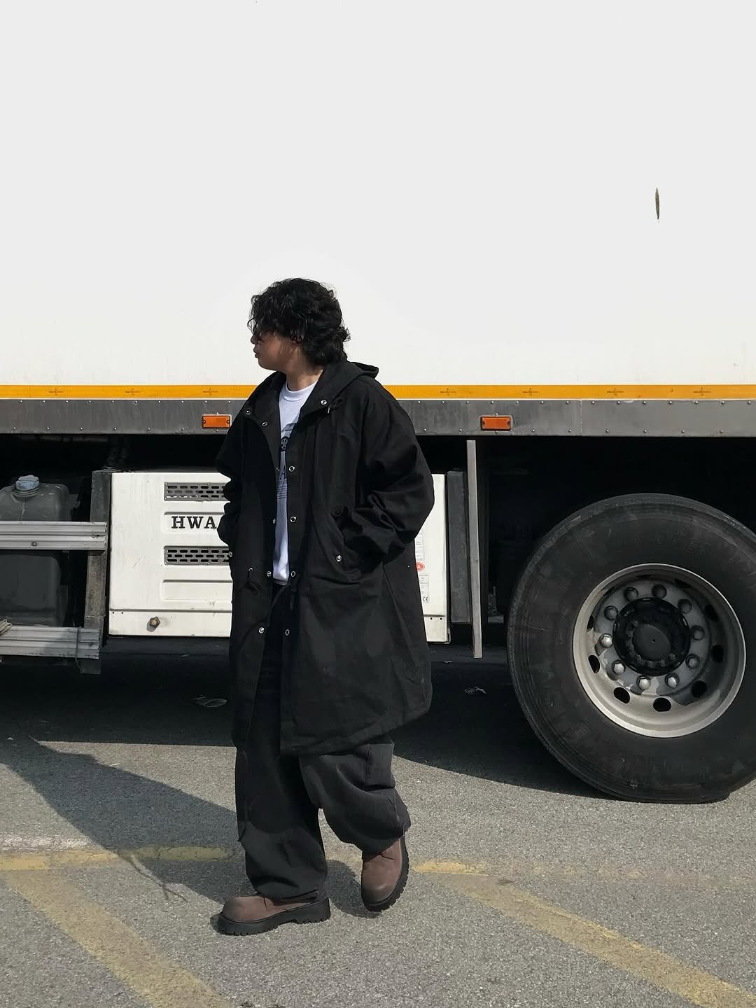 Photo shared by 오윤택/오태기 on February 17, 2026 tagging @ohtaeki_official. May be an image of one or more people, people standing, overcoat, truck and text.