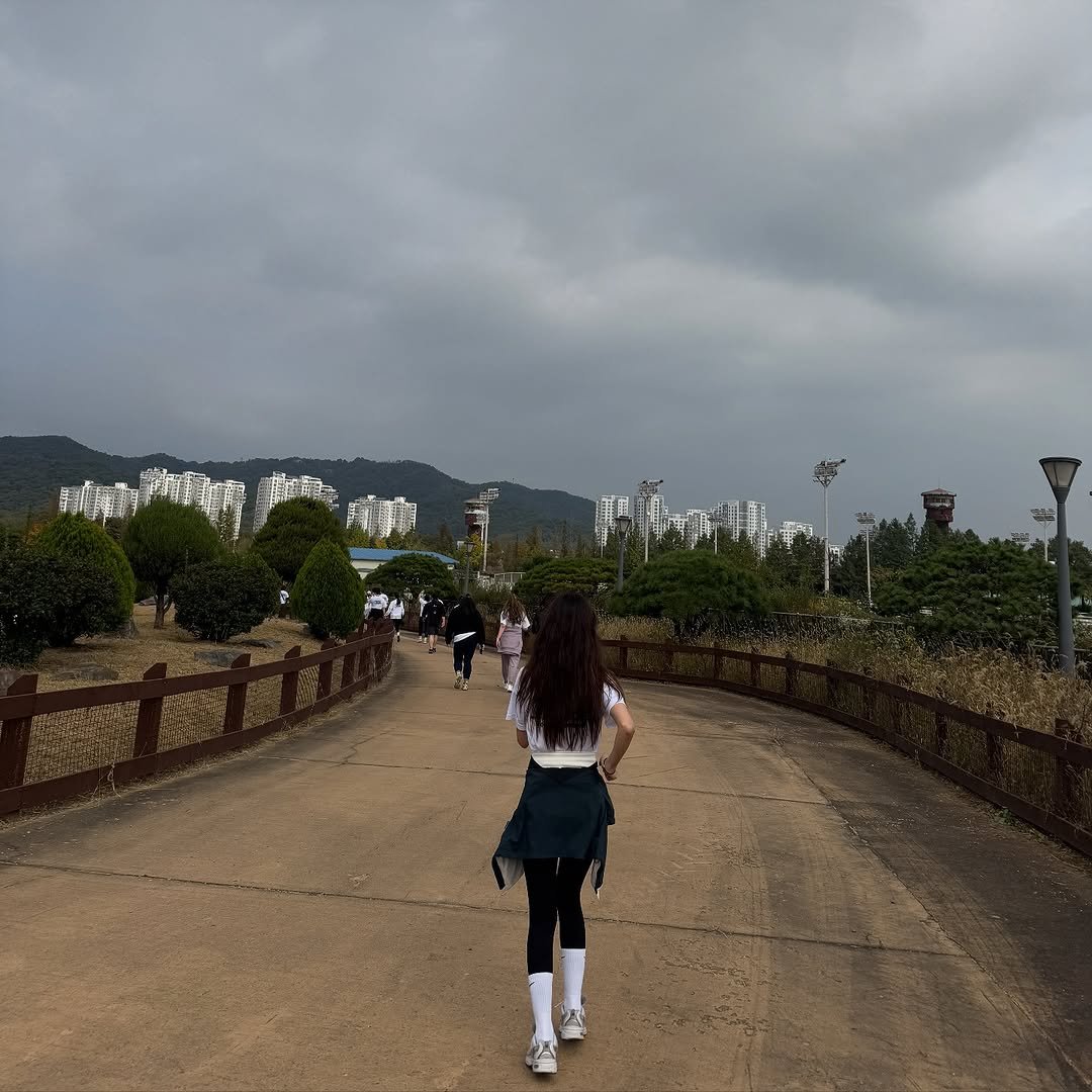 Photo shared by 여니 on November 04, 2025 tagging @luvdentiste. May be an image of cloud, road, fog, windmill and park.