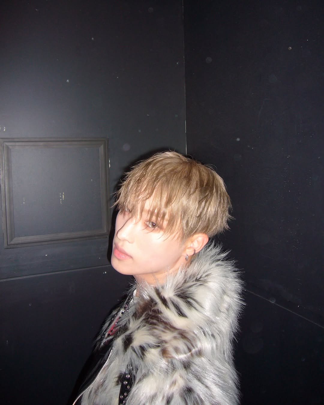 Photo by P1Harmony (피원하모니) on December 17, 2025. May be an image of one or more people, bangs, blonde hair, top, bolo tie and text.