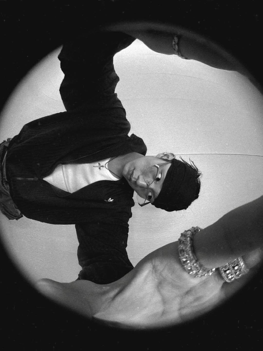 Photo shared by P1Harmony (피원하모니) on April 02, 2026 tagging @takkibabyy. May be a black-and-white image of mirror, tambourine and text.