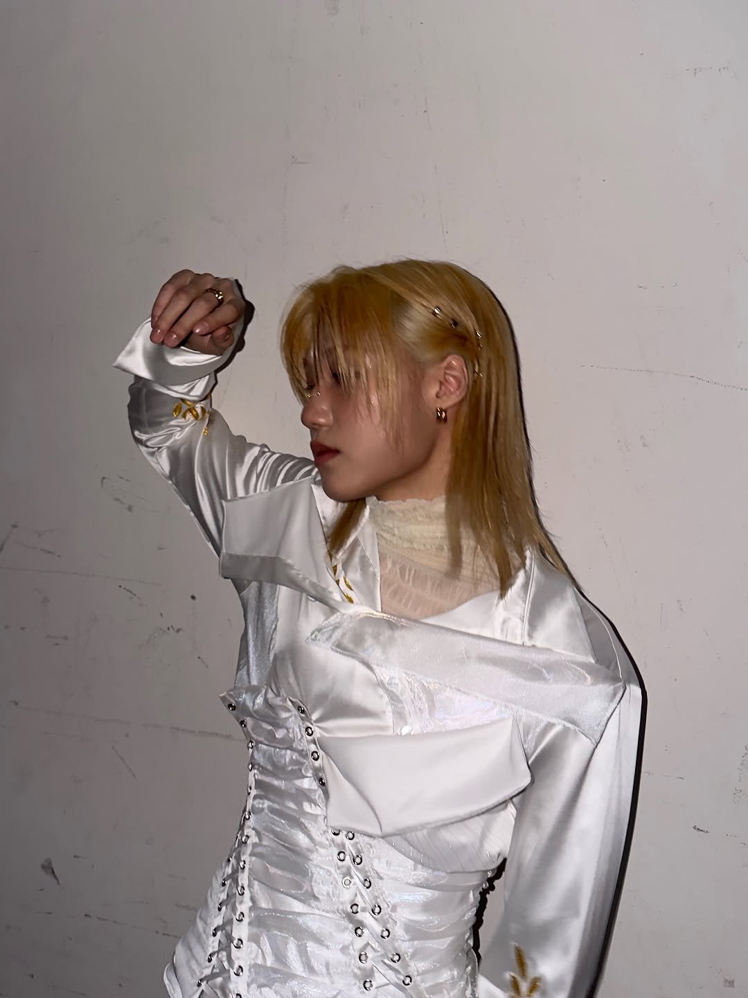 Photo by P1Harmony (피원하모니) on February 11, 2026. May be an image of one or more people, hair, bolo tie, costume and text.