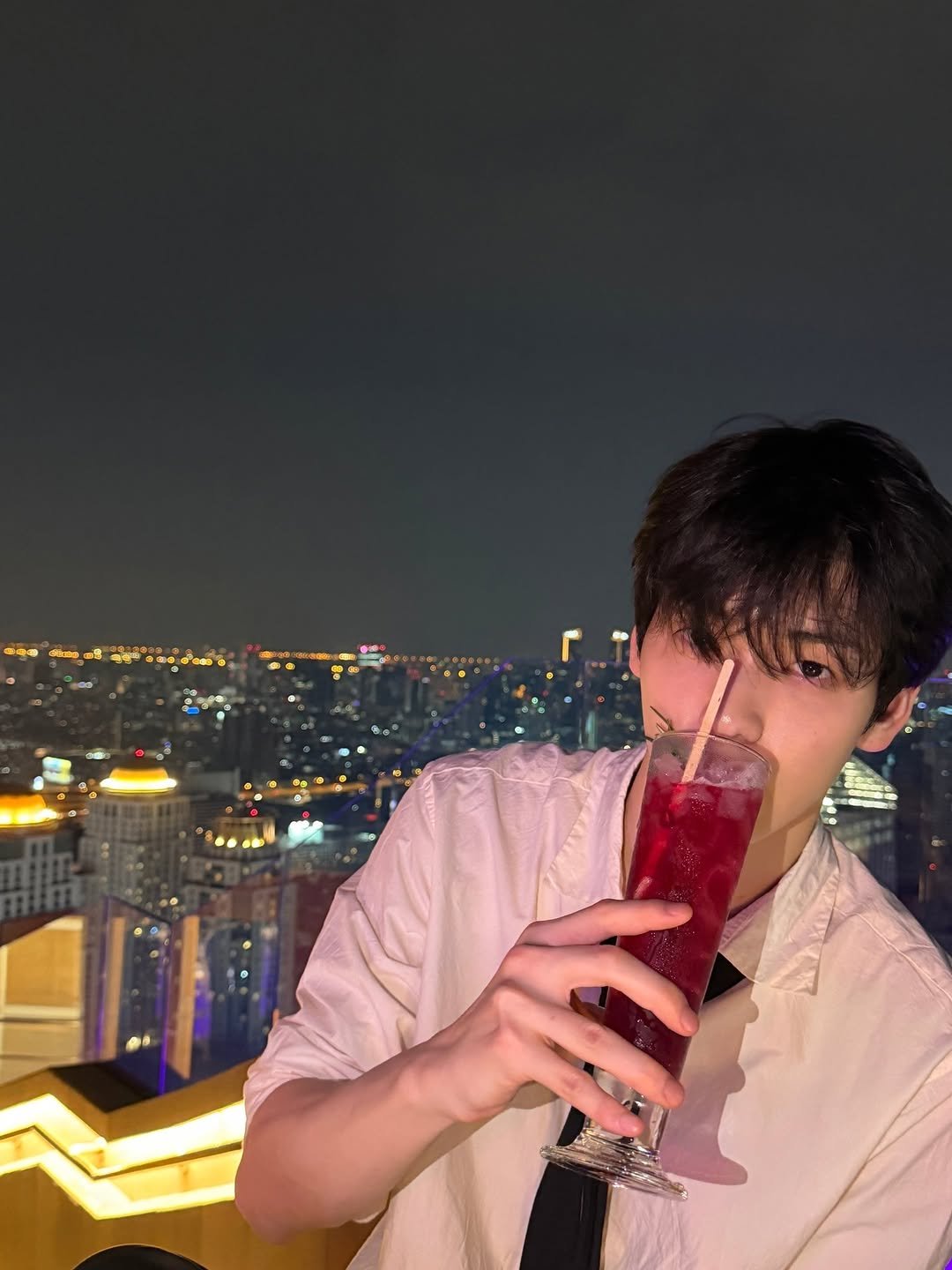Photo by SOOBIN Of TXT on March 26, 2026. May be an image of drink, night and text.