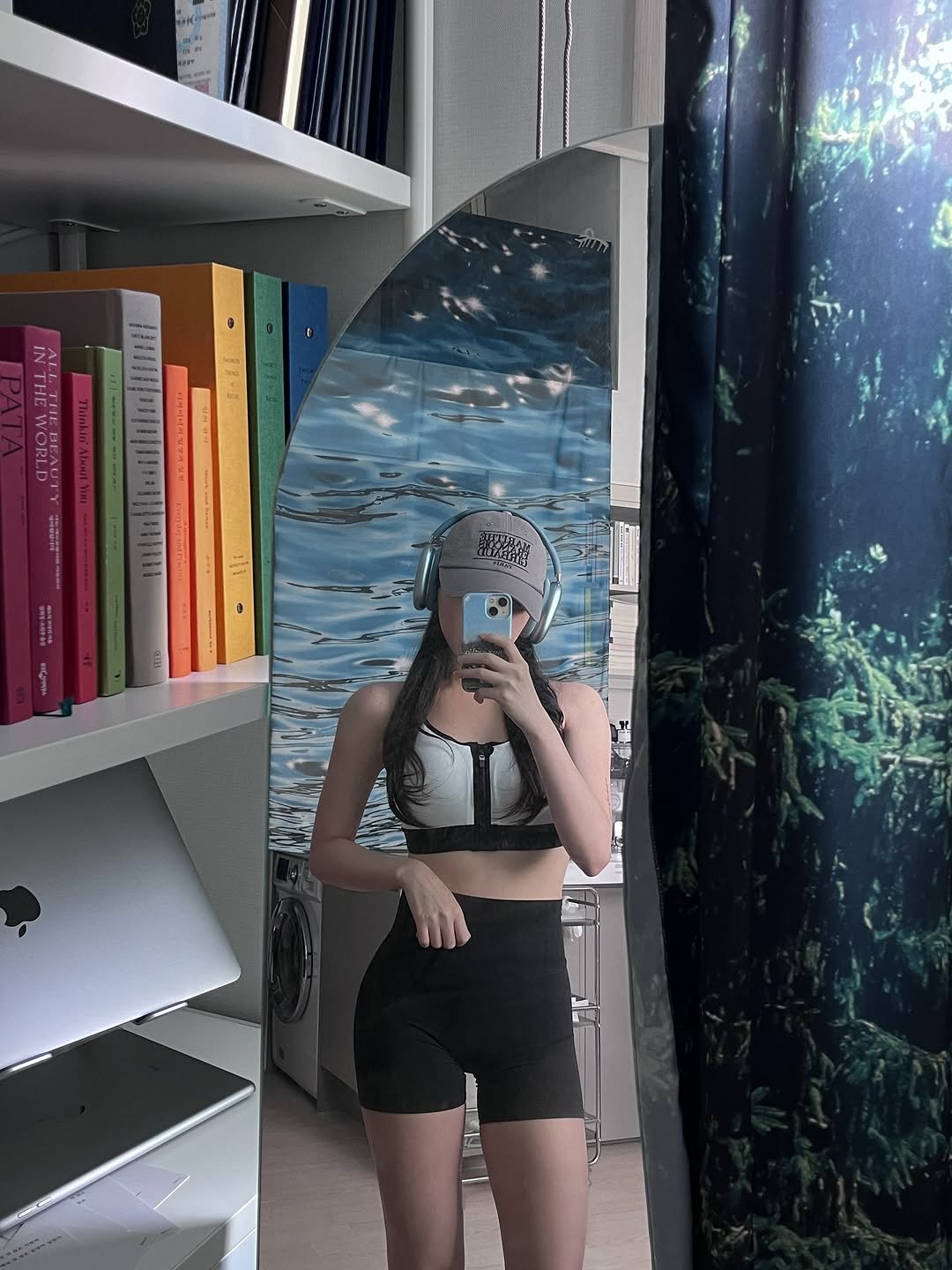 Photo by 밍서 on October 26, 2025. May be an image of mirror, shorts and text.