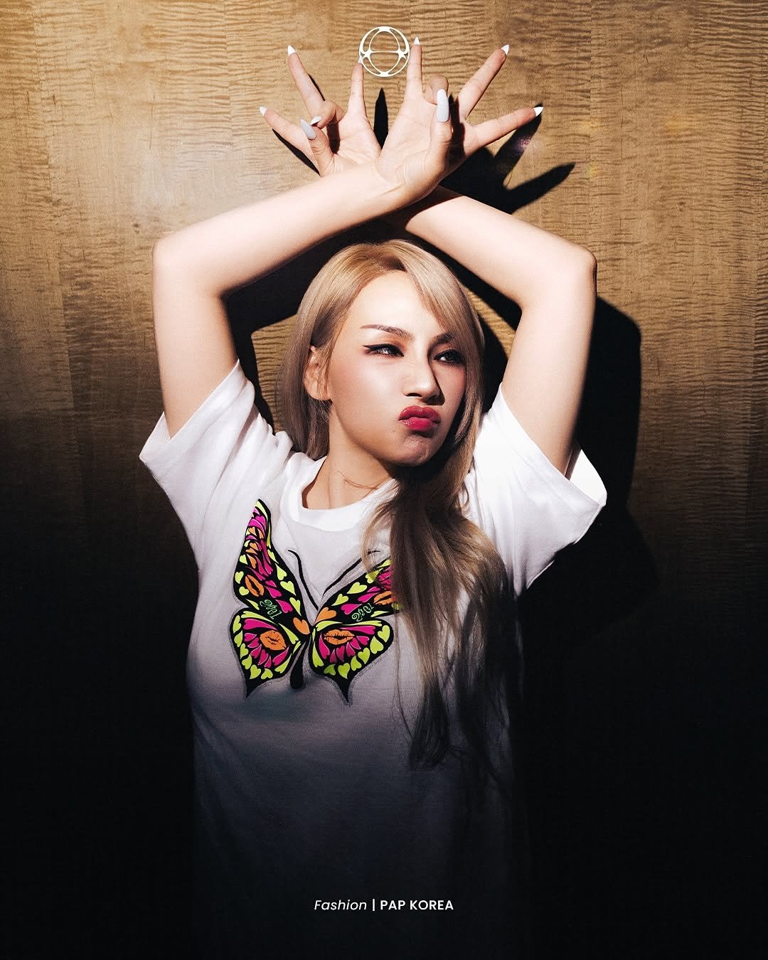 Photo shared by PAP KOREA 팝 코리아 on August 11, 2025 tagging @chaelincl, and @saint_mx6_official. May be an image of 1 person, braids, makeup, top, poster and text that says 'Fashion Fashion|PAPKOREA PAP KOREA'.