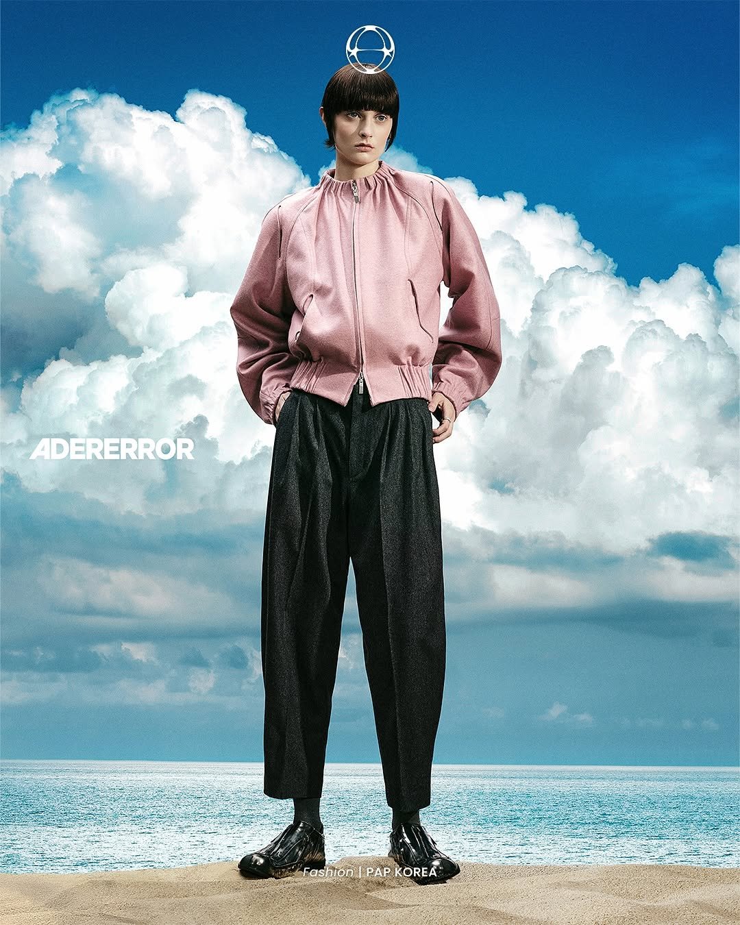 Photo shared by PAP KOREA 팝 코리아 on September 09, 2025 tagging @ader_error. May be an image of 1 person, duffle coat, poster, magazine, sportswear and text that says 'ADERERROR Fashion Fashion|PAPKOREA PAP KOREA'.