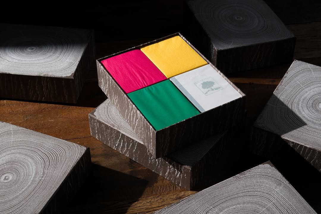 Photo by paper press on December 11, 2025. May be an image of paper weight, box, carton and text.