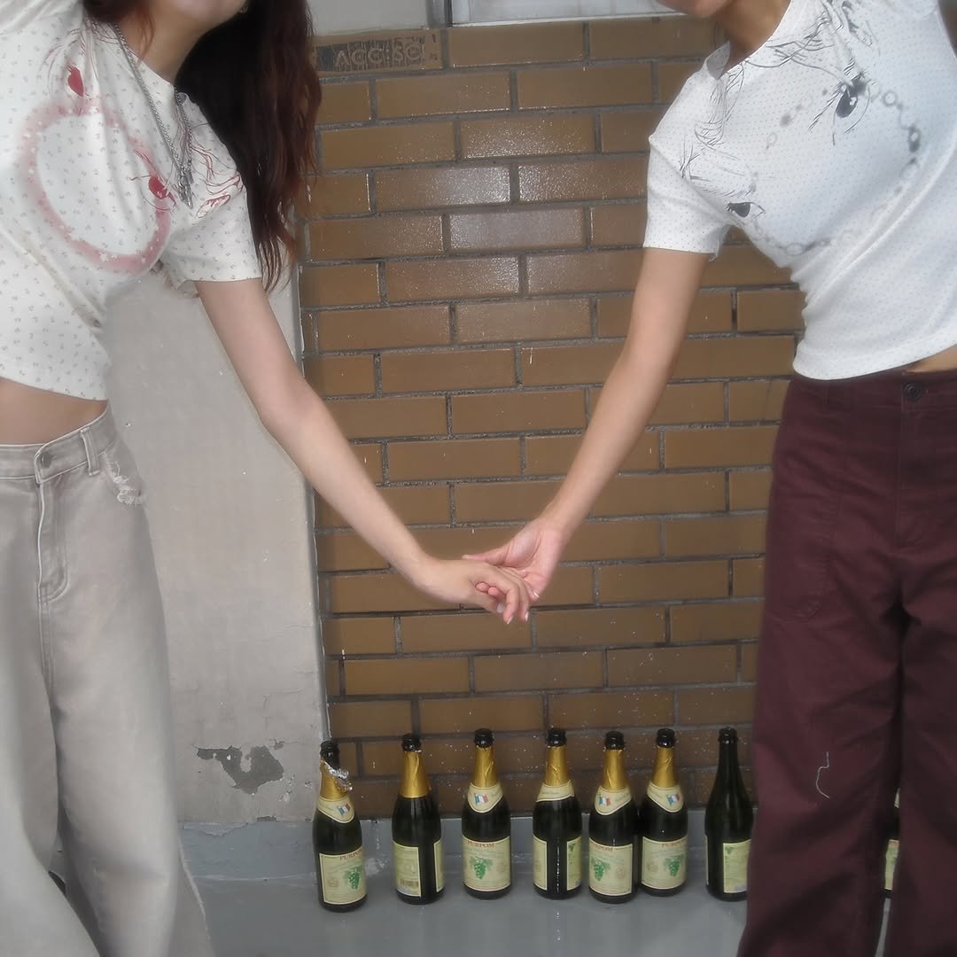 Photo shared by Soft Life Glide on September 28, 2025 tagging @seoyewony, @paper_press, and @namiimyo. May be an image of 2 people, champagne, wine bottle, top and text.