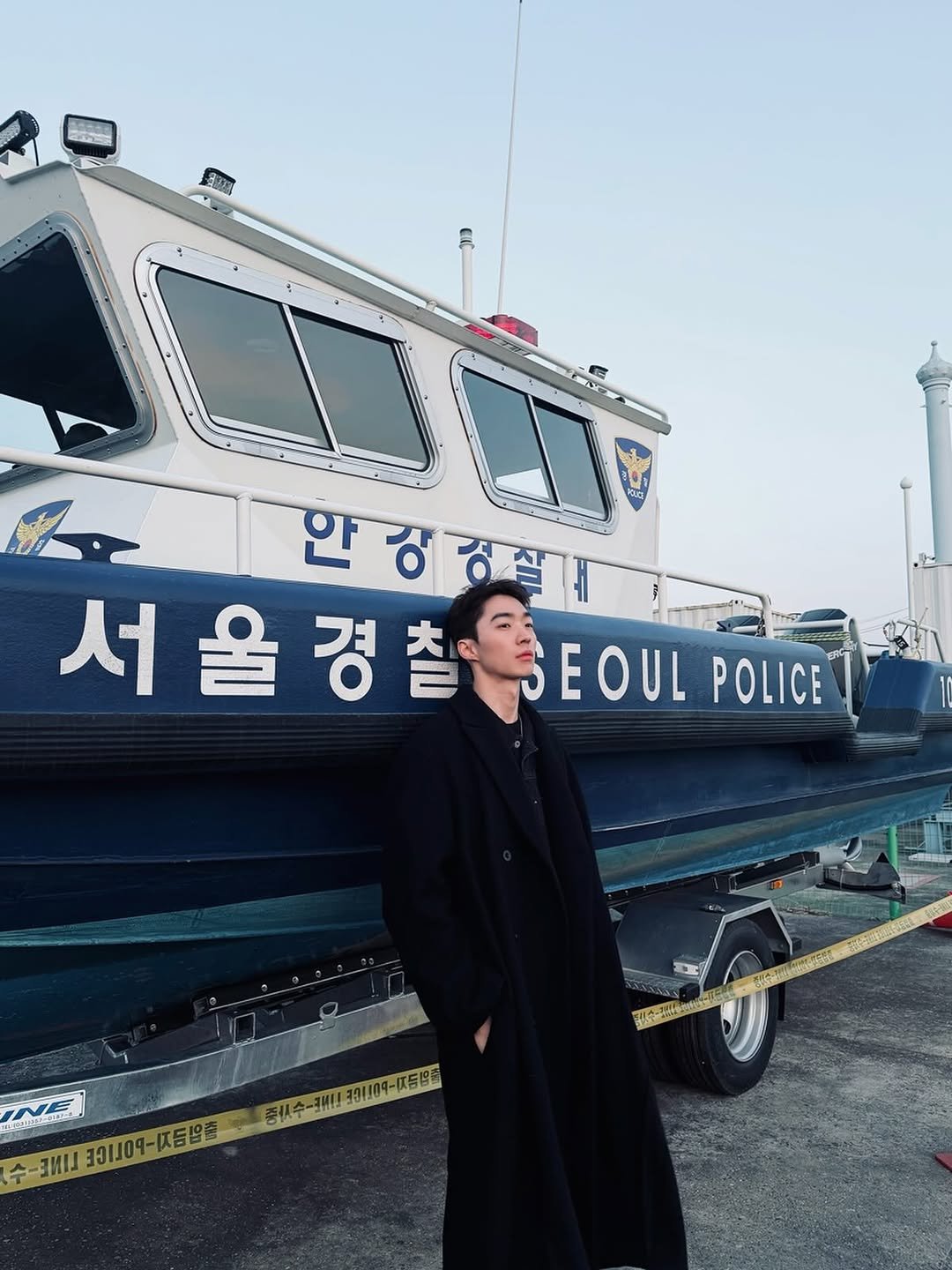 Photo by 박유리 / YURI PARK in Seoul, South Korea. May be an image of duffle coat, overcoat and text.