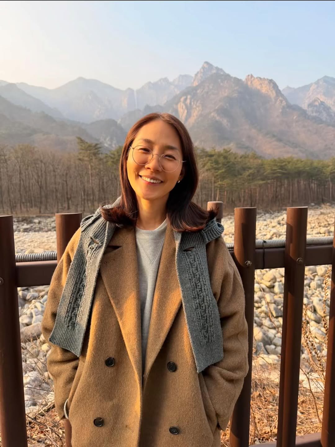 Photo by Ji Hye Park on February 15, 2026. May be an image of duffle coat, overcoat, parka, jacket, Gyeongbokgung Palace, the Great Wall of China and text.