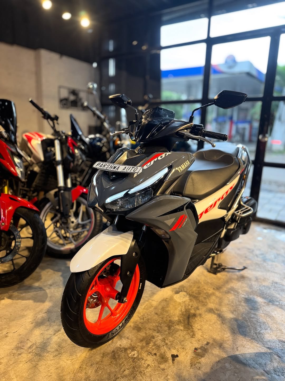 Photo by Parshwa Auto on September 06, 2025. May be an image of motorcycle, scooter and text.