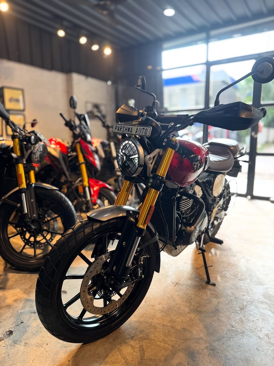 Photo by Parshwa Auto on September 01, 2025. May be an image of motorcycle and text.