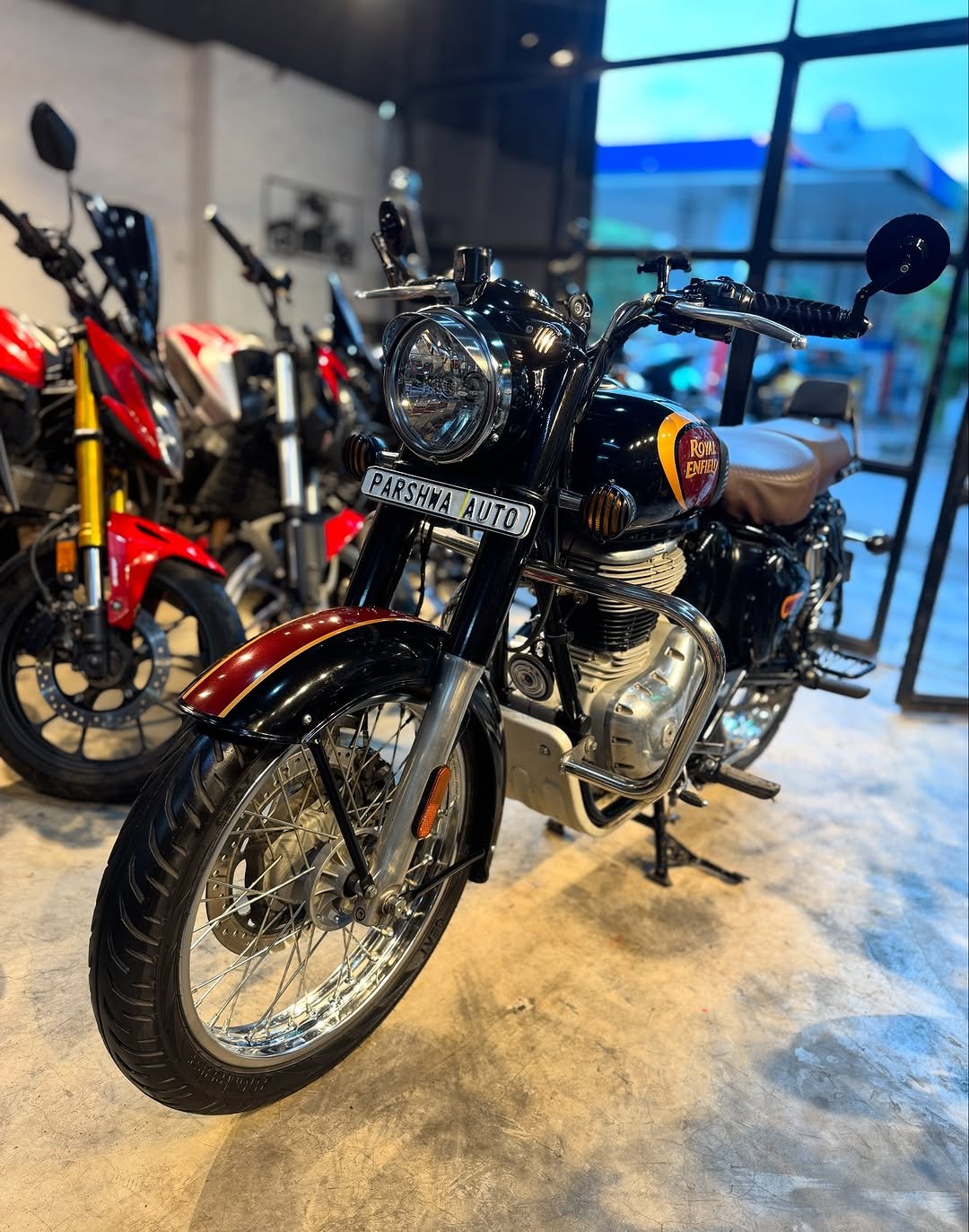 Photo by Parshwa Auto on September 02, 2025. May be an image of motorcycle and text.