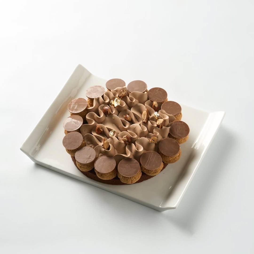 Photo shared by @clmarket_baking on January 12, 2026 tagging @pas_a_pas_baking_studio0272. May be an image of tart, wafer and text.