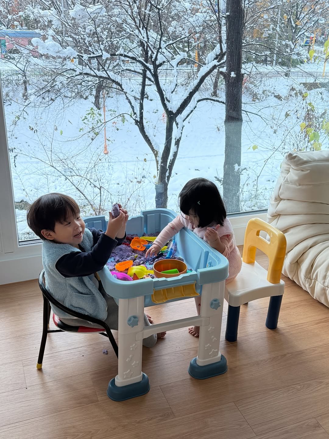 Photo by 최 진희 on September 23, 2025. May be an image of 2 people, baby, snow and text.