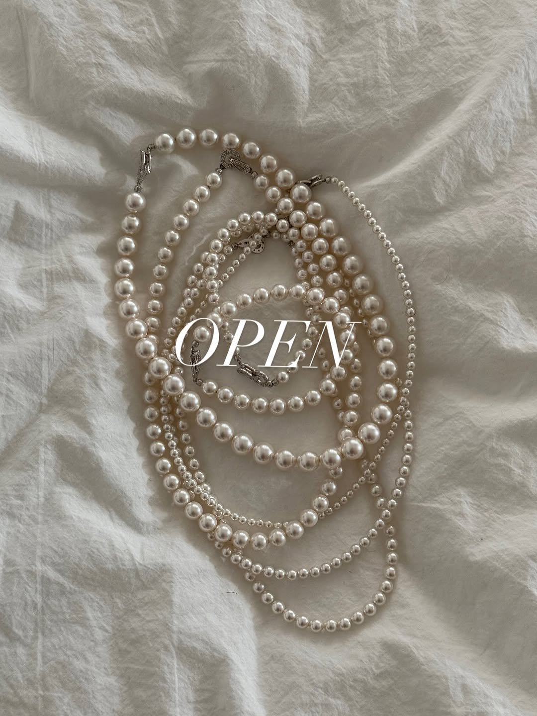 Photo by 최 진희 on November 06, 2025. May be an image of jewelry and text that says 'OPEA'.