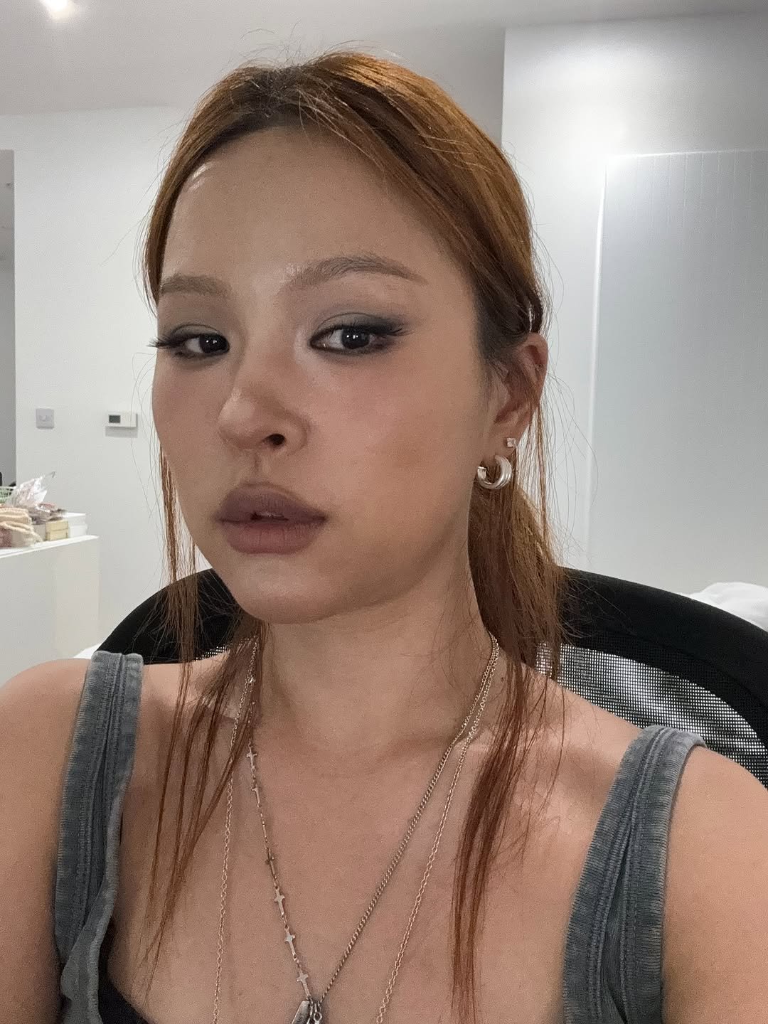 Photo by 이나 | Ena on July 13, 2025. May be a selfie of 1 person, braids, lipstick and text.