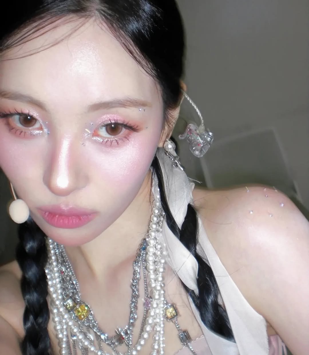 Photo shared by 이나 | Ena on November 26, 2025 tagging @enathin9. May be an image of one or more people, braids, makeup and text.