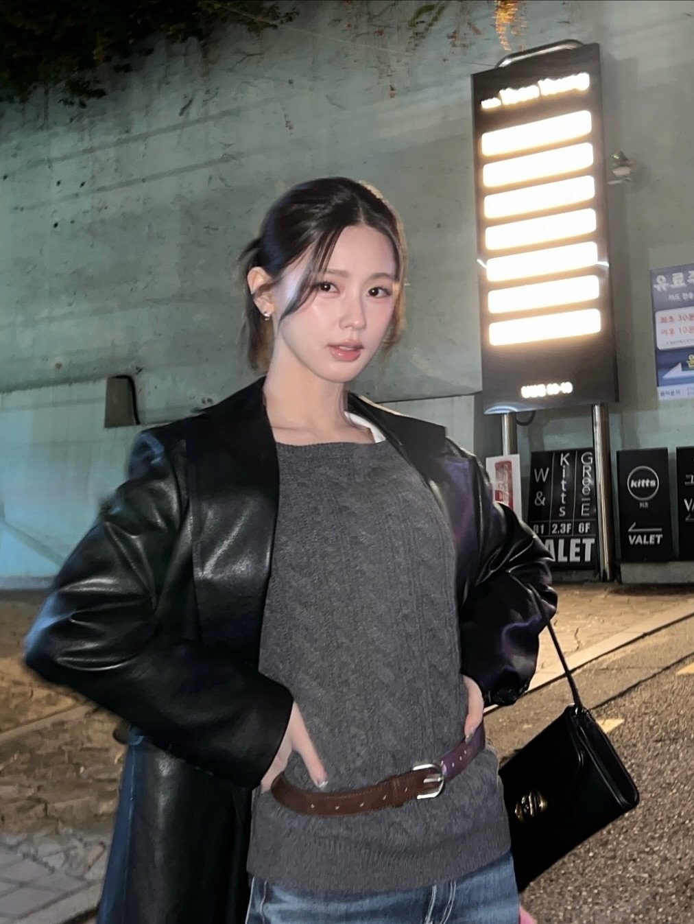 Photo shared by 이나 | Ena on November 21, 2025 tagging @enathin9. May be an image of one or more people, hair, goosedown coat, duffle coat, parka, turtleneck, jacket, top and text.