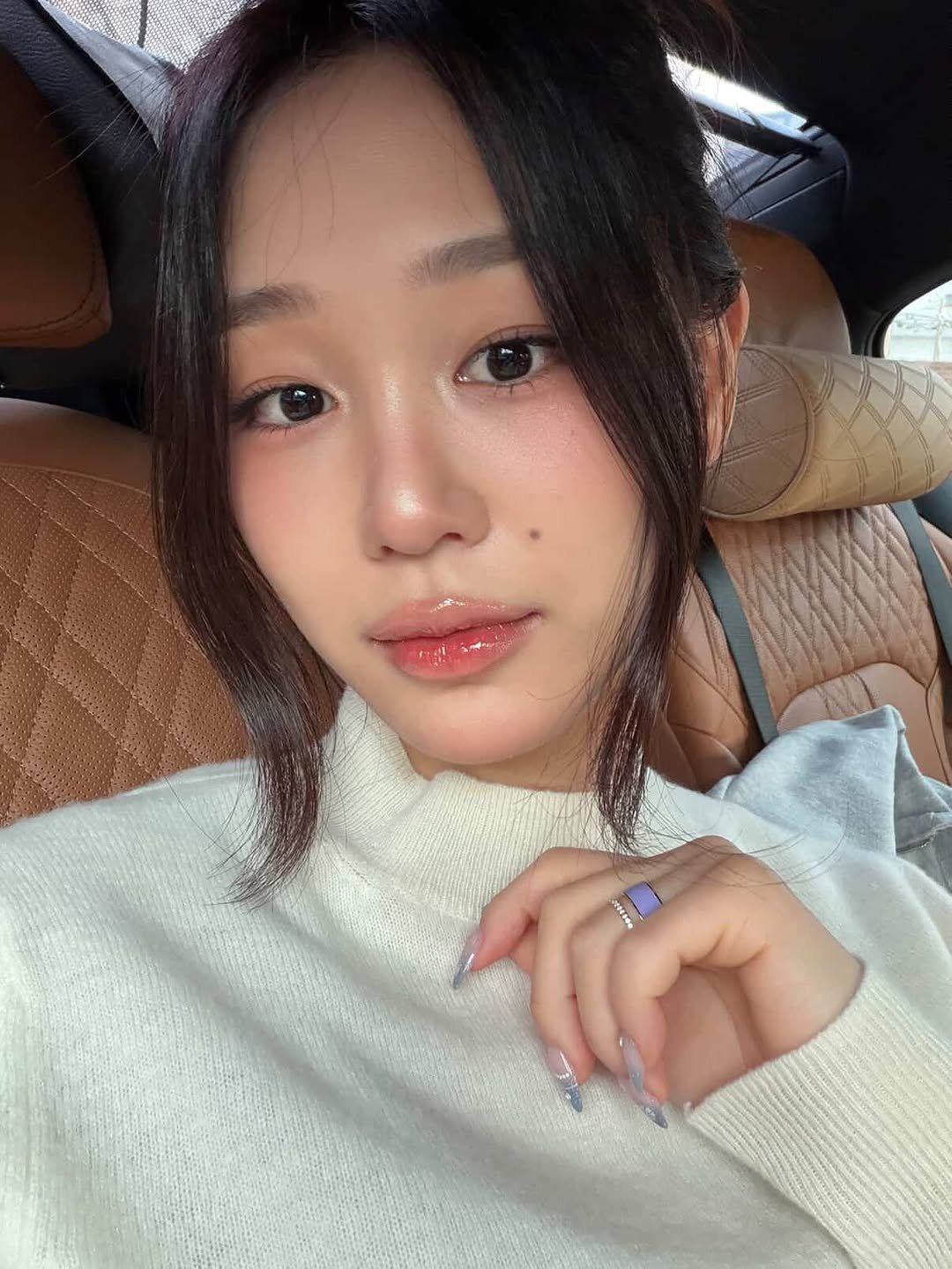 Photo shared by 이나 | Ena on January 05, 2026 tagging @enathin9. May be a selfie of one or more people, lipstick, makeup, hair, turtleneck and text.