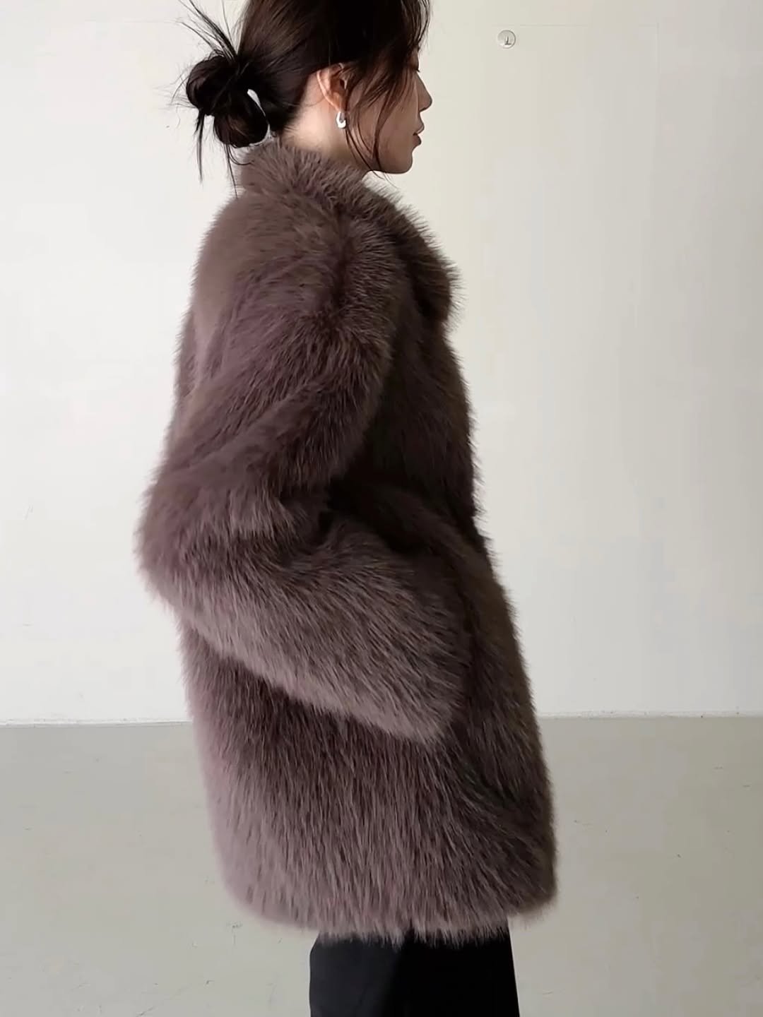 Photo by PECAN 피칸 on January 29, 2026. May be an image of sable coat, overcoat, goosedown coat, parka, jacket and text.