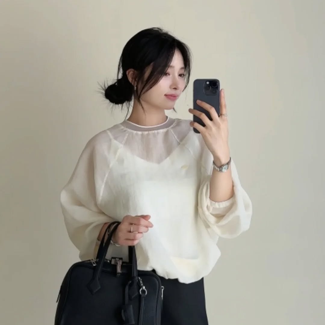 Photo by PECAN 피칸 on September 23, 2025. May be an image of 1 person, purse, top and text.