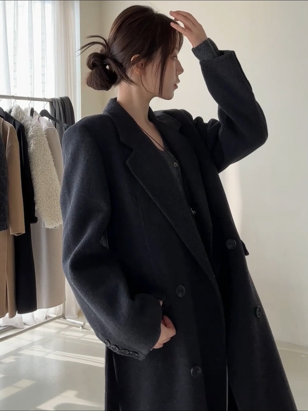Photo by PECAN 피칸 on November 02, 2025. May be an image of duffle coat, sable coat, overcoat, jacket, parka, wool and text.