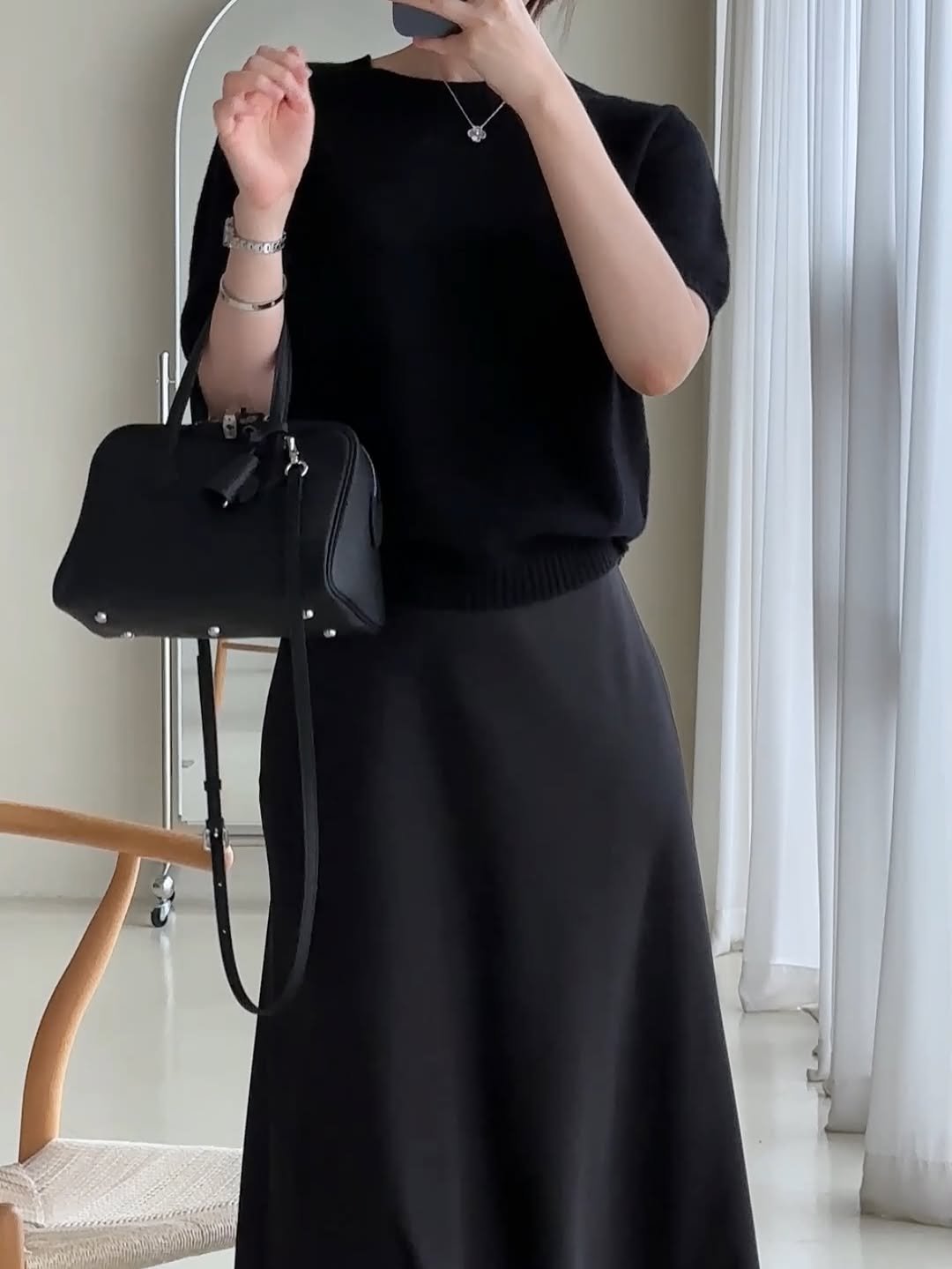 Photo by PECAN 피칸 on September 18, 2025. May be an image of 1 person, top, dress, skirt and text.