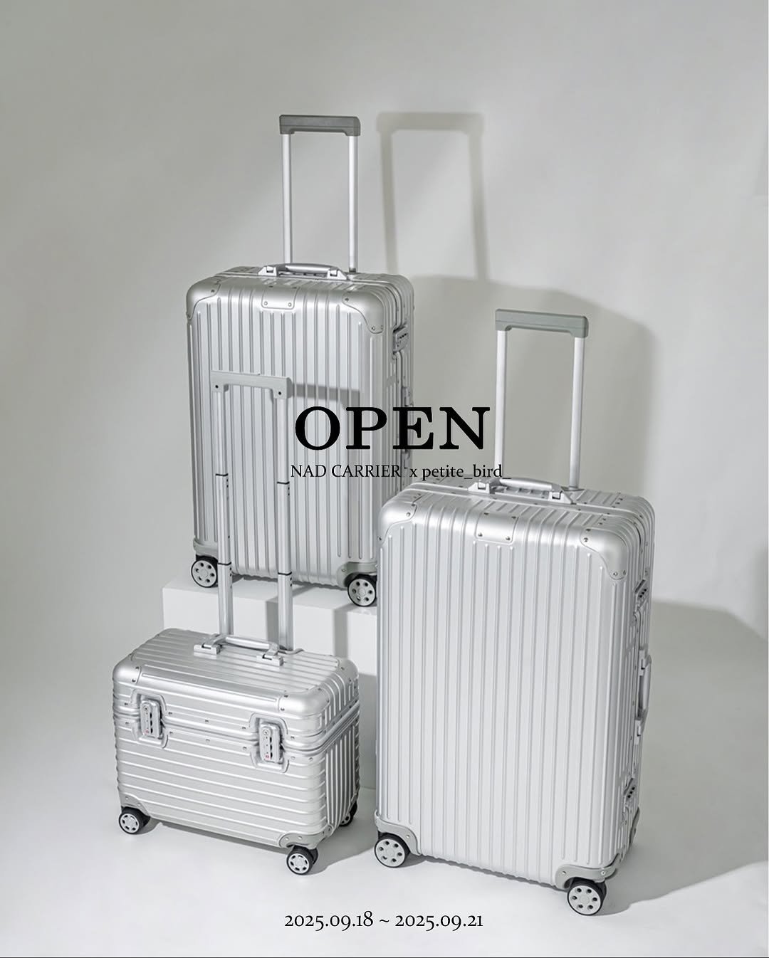 Photo by 박나래 on September 17, 2025. May be an image of suitcase, luggage, briefcase, trolley and text that says 'OPEN EN OPE NAD CARRIER petite NADCARRIER:*xpetite_bird bird 0- KLTE 2025.09.18 2025.09.18~2025.09.21 2025.09.21'.
