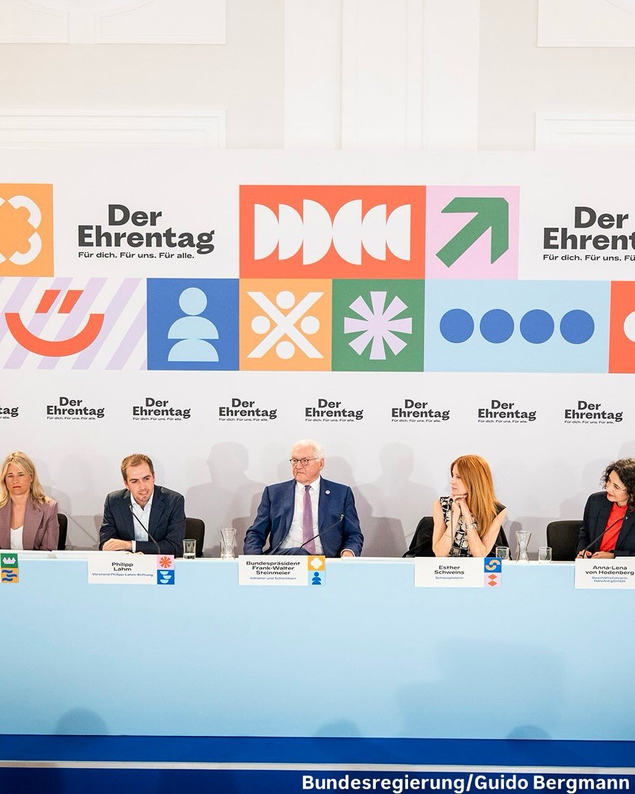 Photo shared by Philipp Lahm on April 23, 2026 tagging @hartplatzhelden_ggmbh, @bundespraesident.steinmeier, @treffpunktverein, and @der.ehrentag. May be an image of poster, magazine, office and text.
