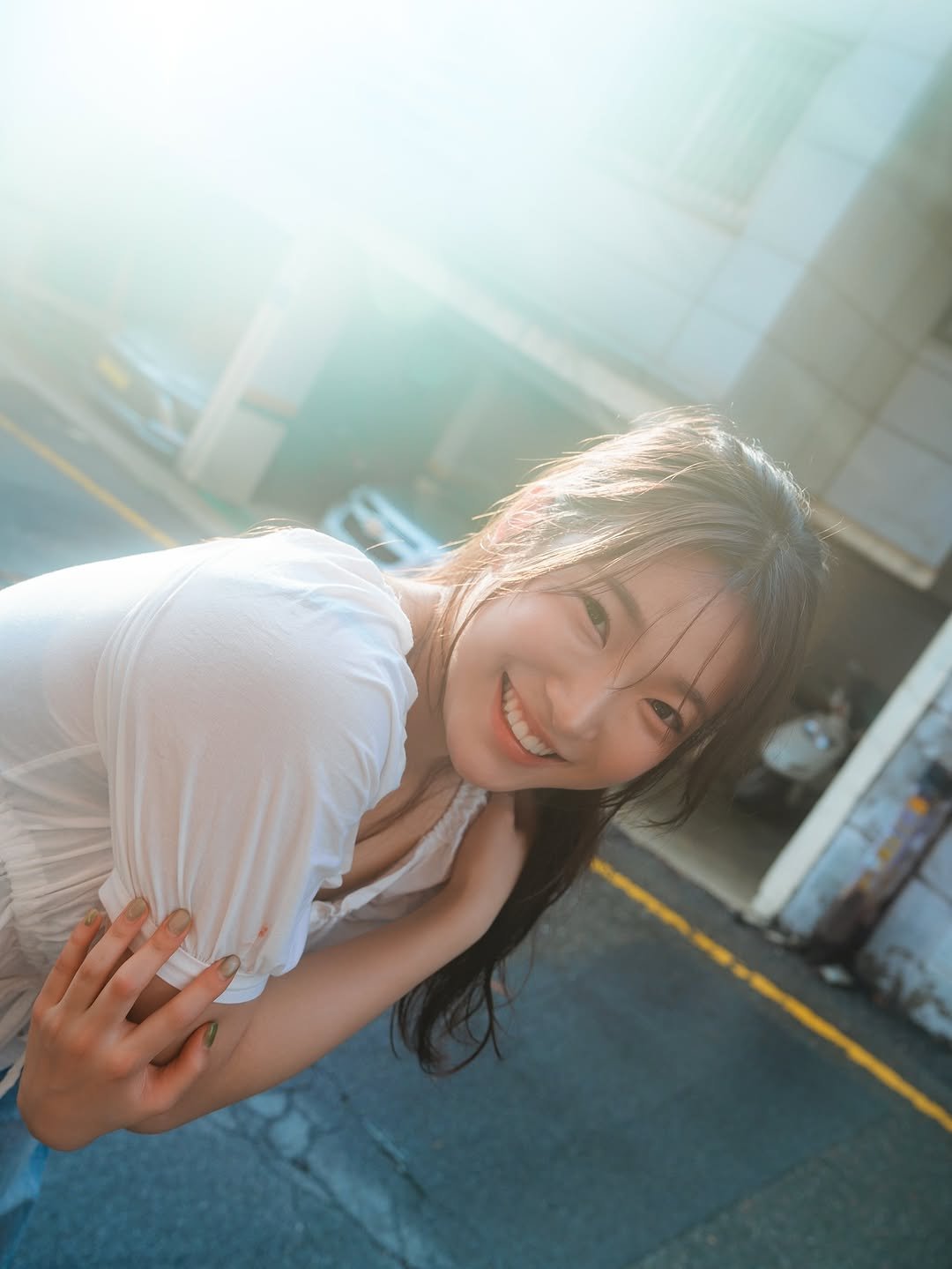 Photo shared by 이선우 on August 09, 2025 tagging @myreveee. May be an image of 1 person, hair, street and text.