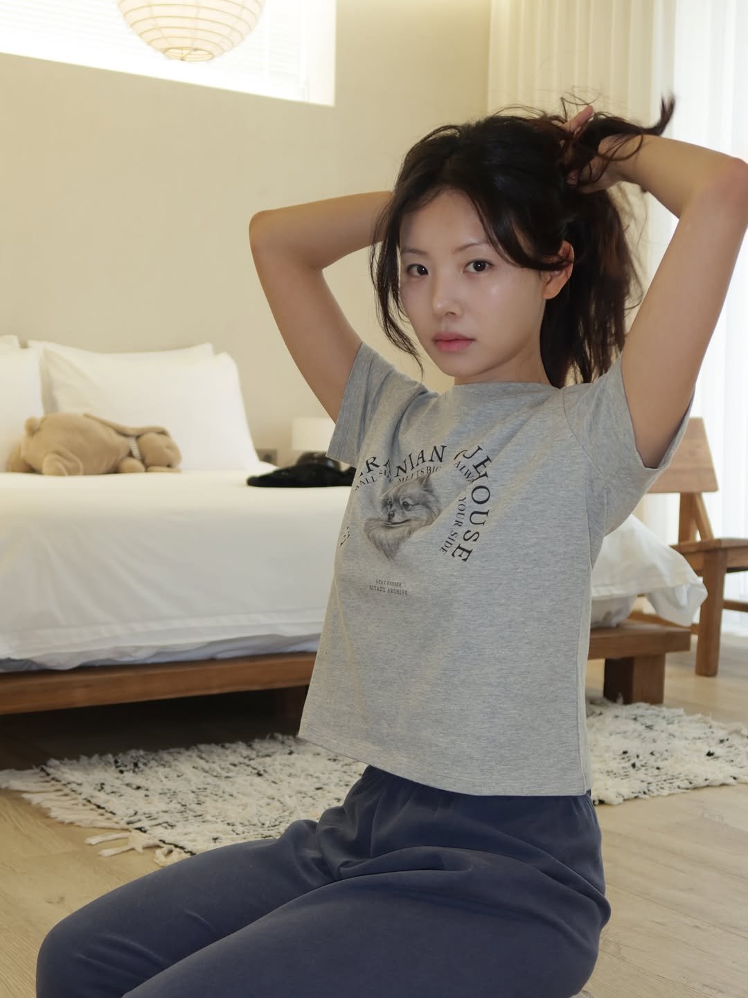 Photo shared by 루피타 LUPITA on March 19, 2026 tagging @siyazu_official. May be an image of one or more people, hair, sleepwear, sweatpants, top and text.