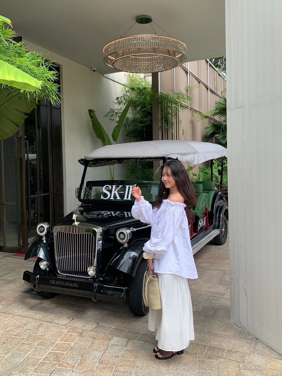 Photo shared by 루피타 LUPITA on March 28, 2026 tagging @skii. May be an image of golf cart, carriage, sarong, parasol, umbrella and text.