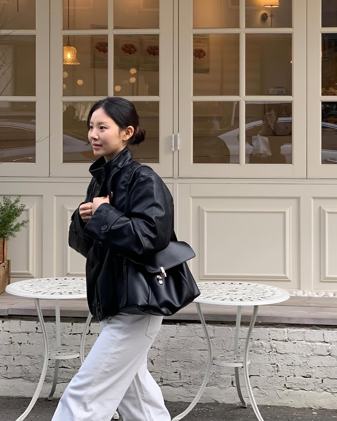 Photo shared by 루피타 LUPITA on February 26, 2026 tagging @official.lememe. May be an image of duffle coat, overcoat, sling, jacket, raincoat, parka, cornflower and text.