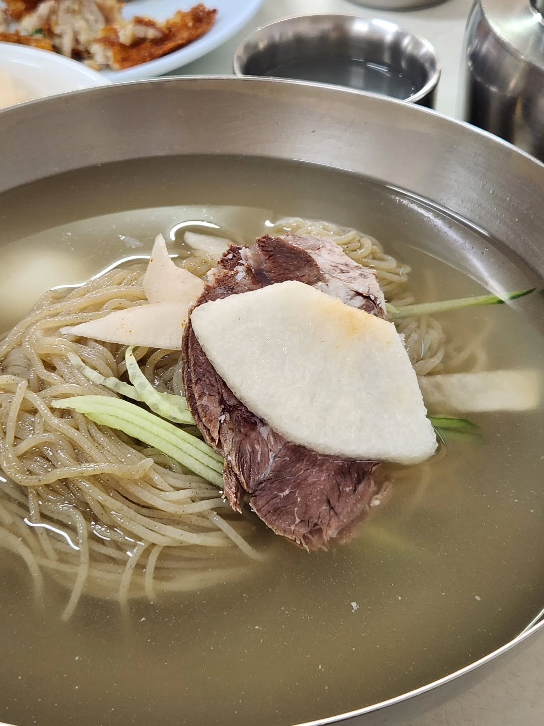 Photo by 재슐랭 in 을밀대. May be an image of ramen, noodles, stew and text.