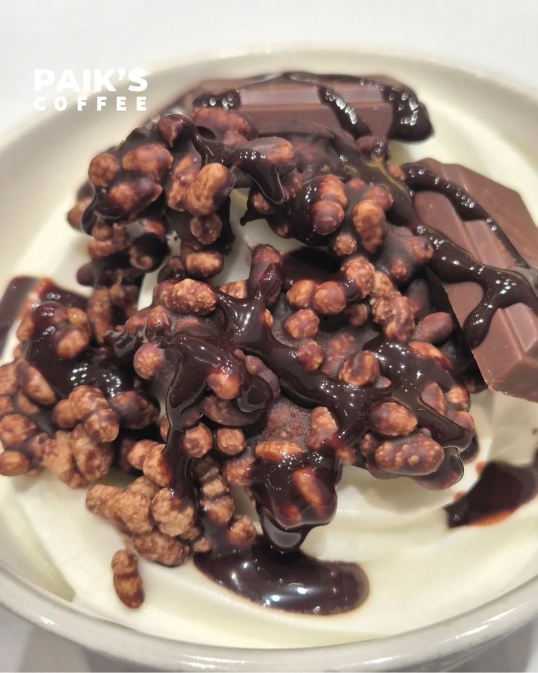 Photo shared by 필그림의 맛집 on February 11, 2026 tagging @paikscoffee_official. May be an image of gelato, yogurt, caramel and text that says 'PAIK'S COFFEE COFFEE'.