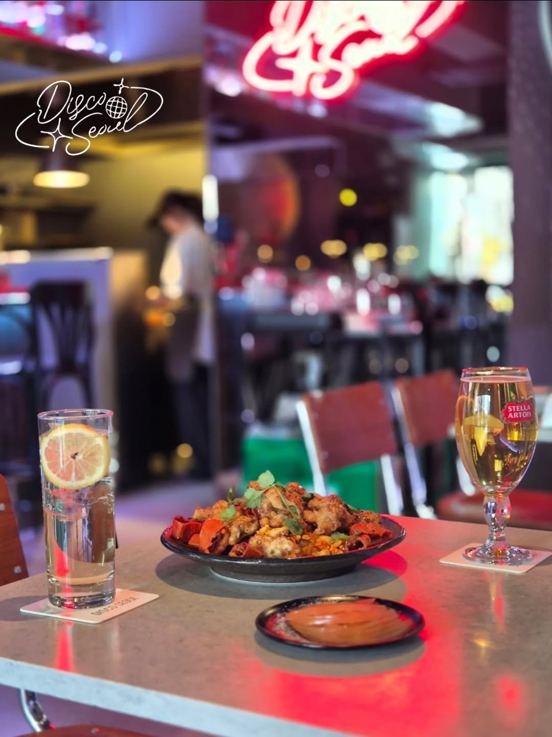 Photo shared by 필그림의 맛집 on April 27, 2026 tagging @disco_seoul. May be an image of chicken, beer and text.