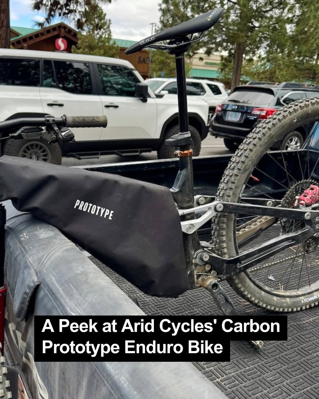 Photo by Pinkbike on February 27, 2026. May be an image of bicycle, tire, rack and text that says 'PROTOTYPE 00の食ン A Peek at Arid Cycles' Carbon Prototype Enduro Bike'.