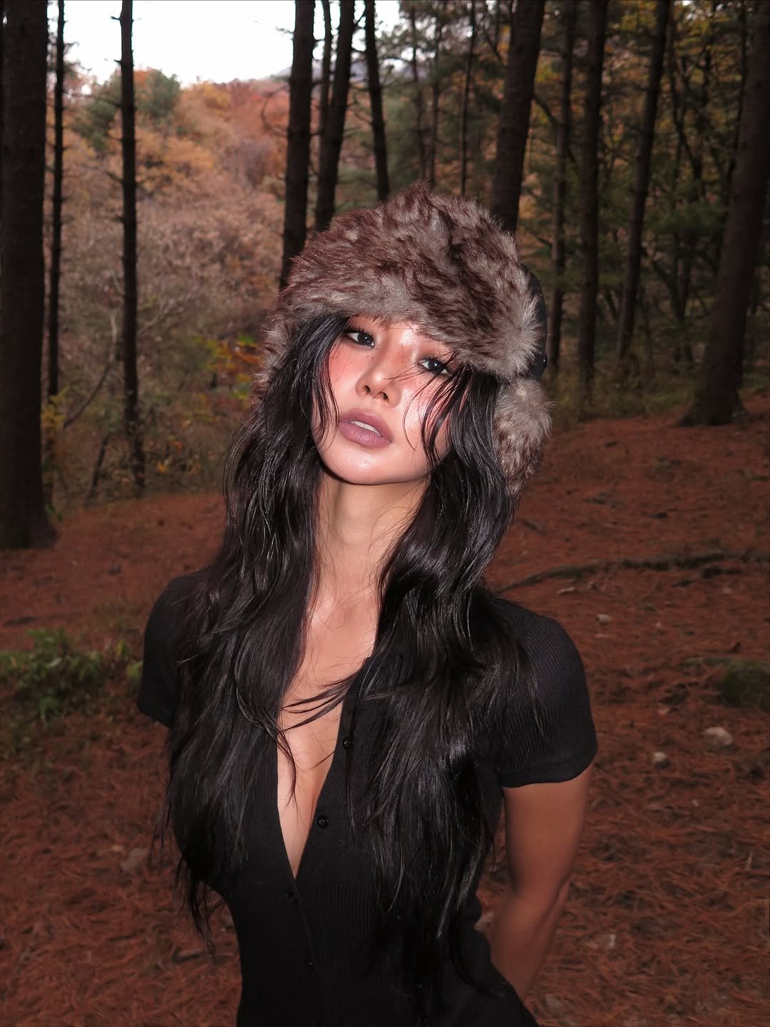 Photo by 천미경 on November 09, 2025. May be an image of one or more people, makeup, fur, headdress, cloak and text.