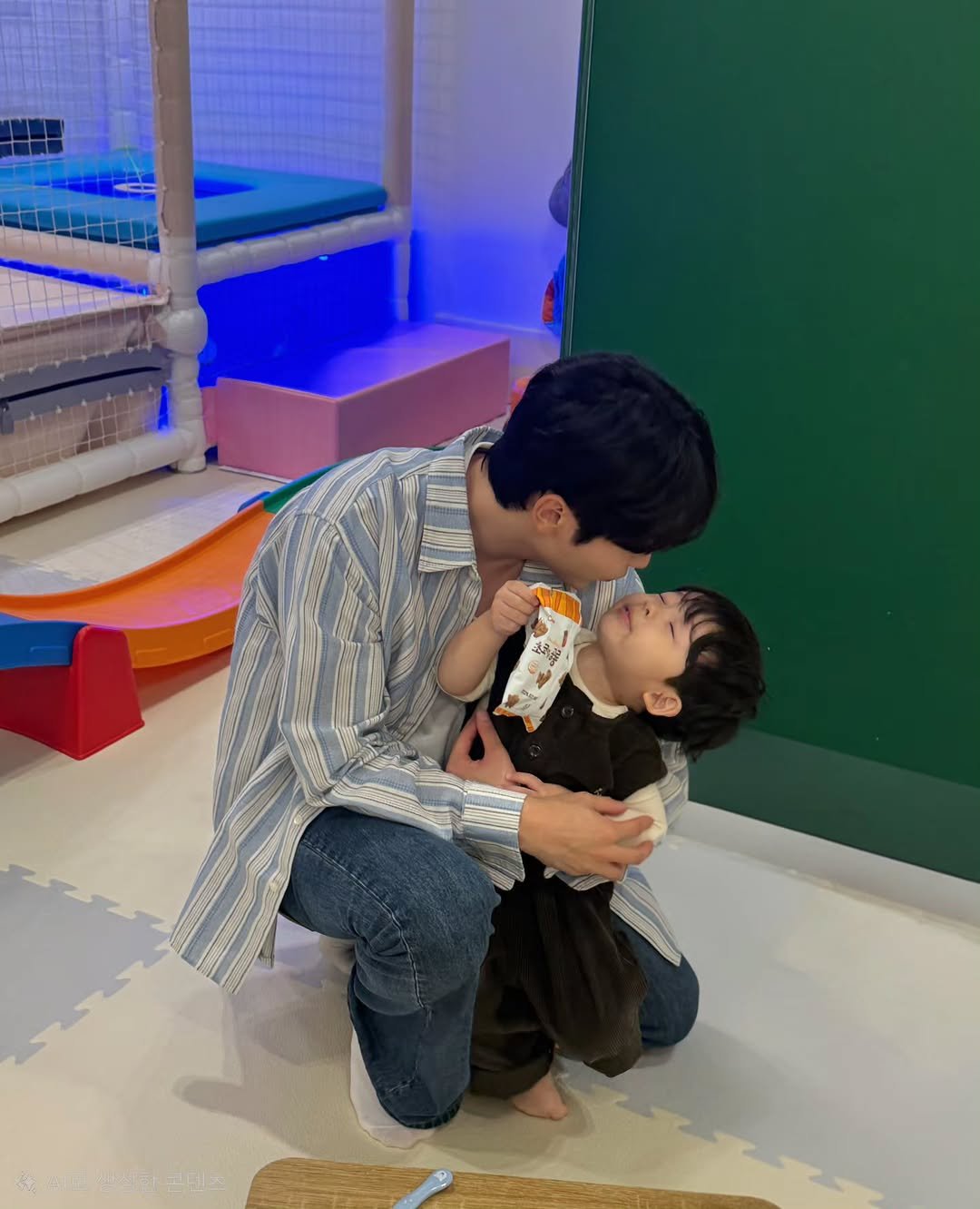 Photo by 승관 SEUNGKWAN on October 17, 2025. May be an image of baby, people kissing and text.