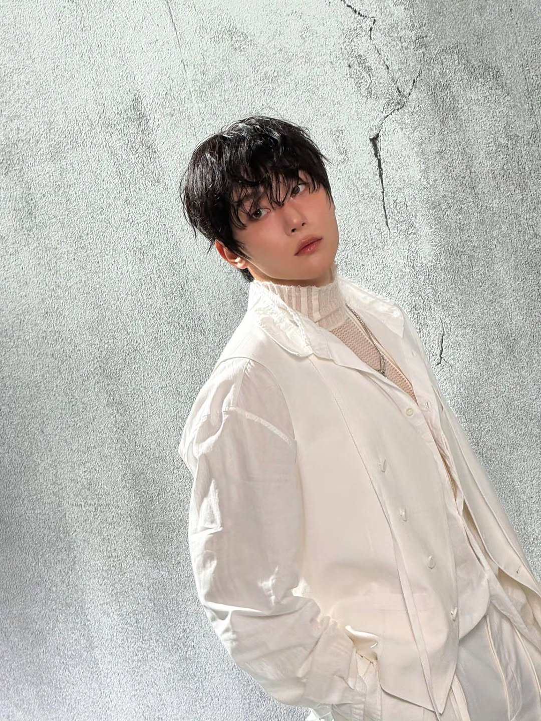 Photo by 승관 SEUNGKWAN on December 23, 2025. May be an image of one or more people, bangs, bolo tie and text.