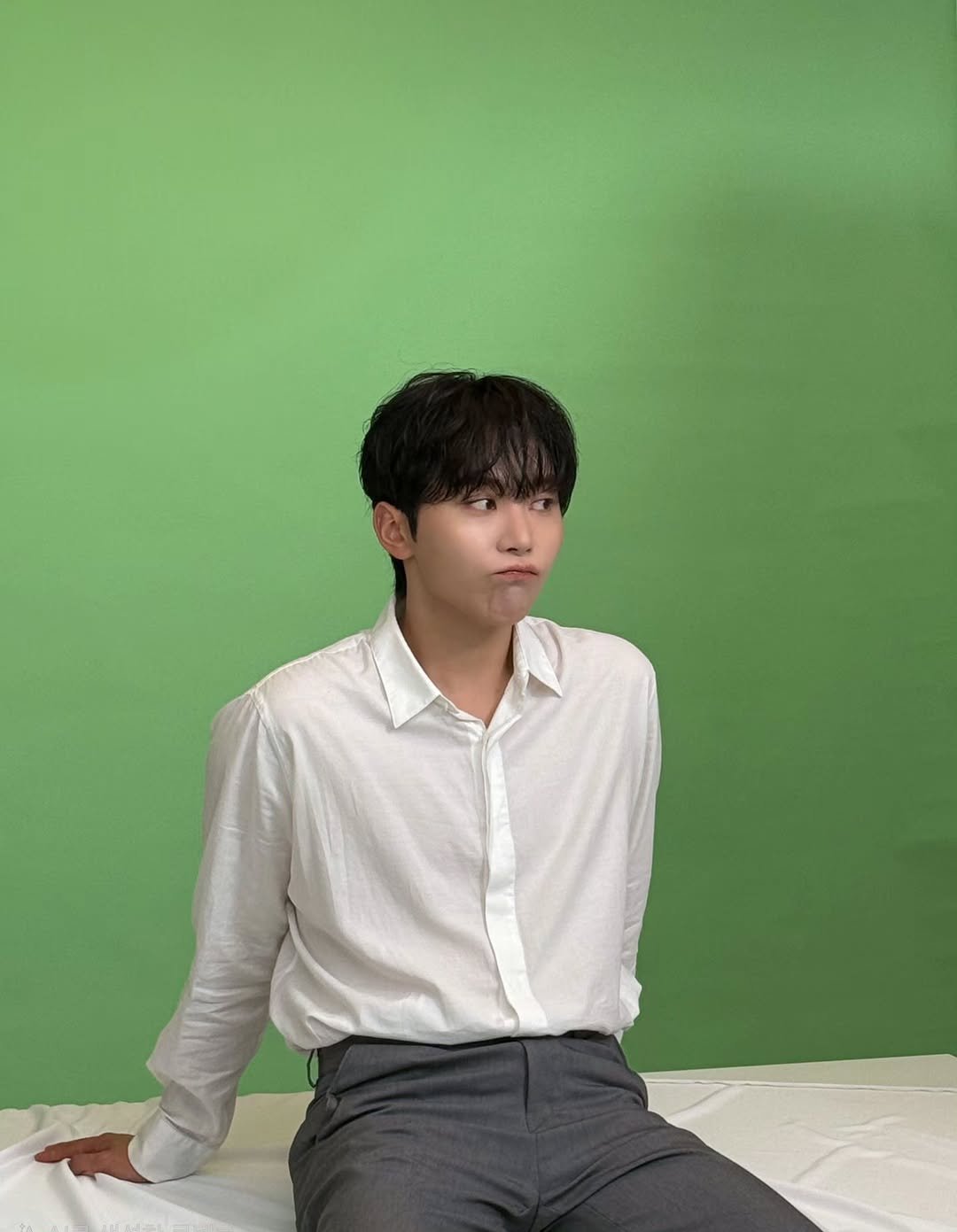 Photo by 승관 SEUNGKWAN on December 13, 2025. May be an image of one or more people, bangs, top and text.